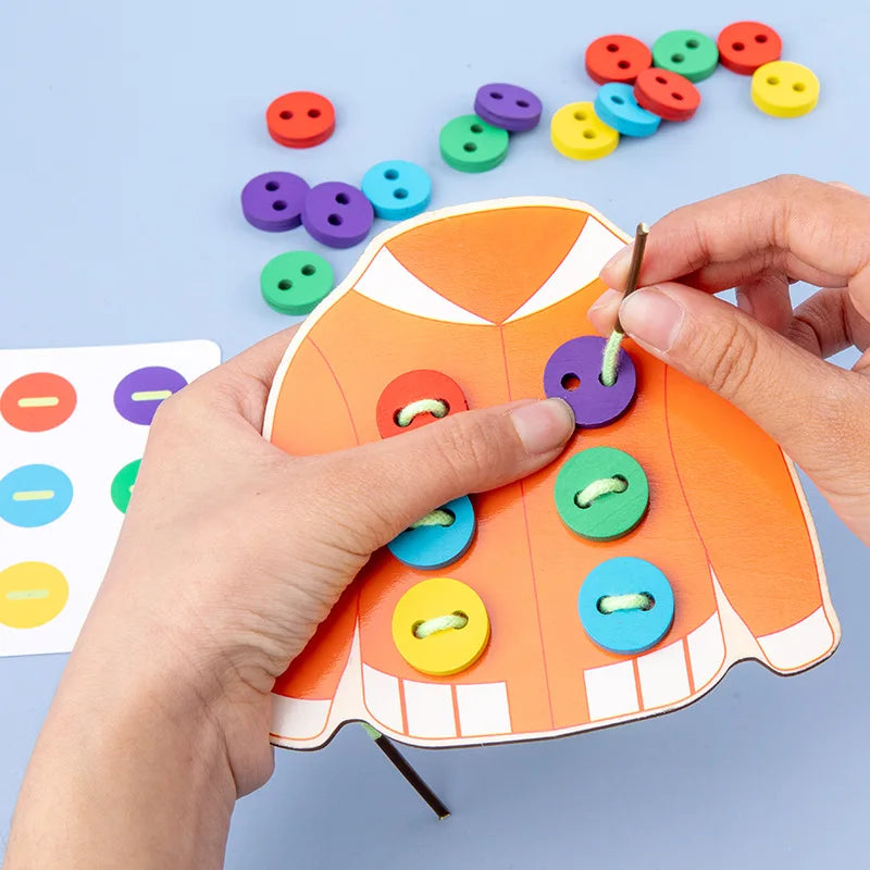 Clothes & button sewing board game.