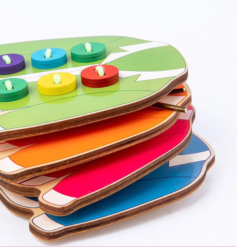 Clothes & button sewing board game.